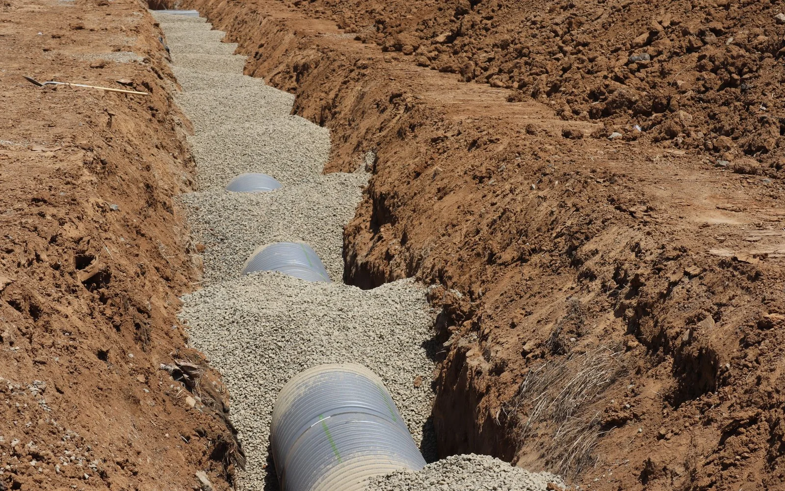 Illustrative underground sewer pipe installation